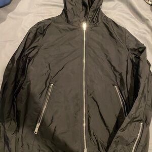 Prada light weight wind breaker. Hardly worn . In great shape black size 38